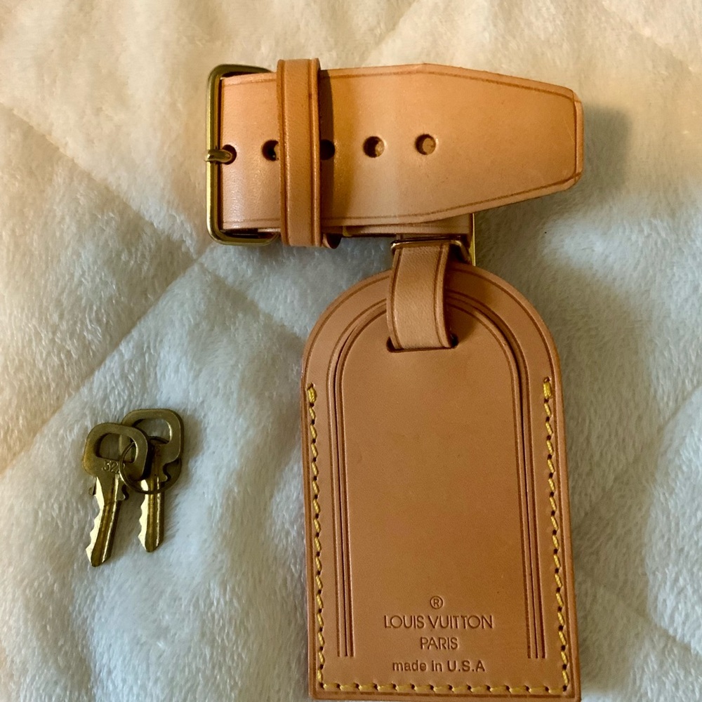 Authentic Louis Vuitton Vachetta luggage travel tag.